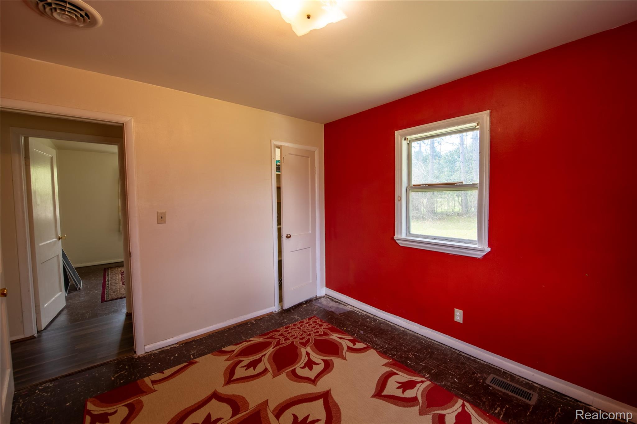 1190 Meadow Road Tawas City, MI 48763 - Photo 20 of 26 Unfurnished bedroom with baseboards