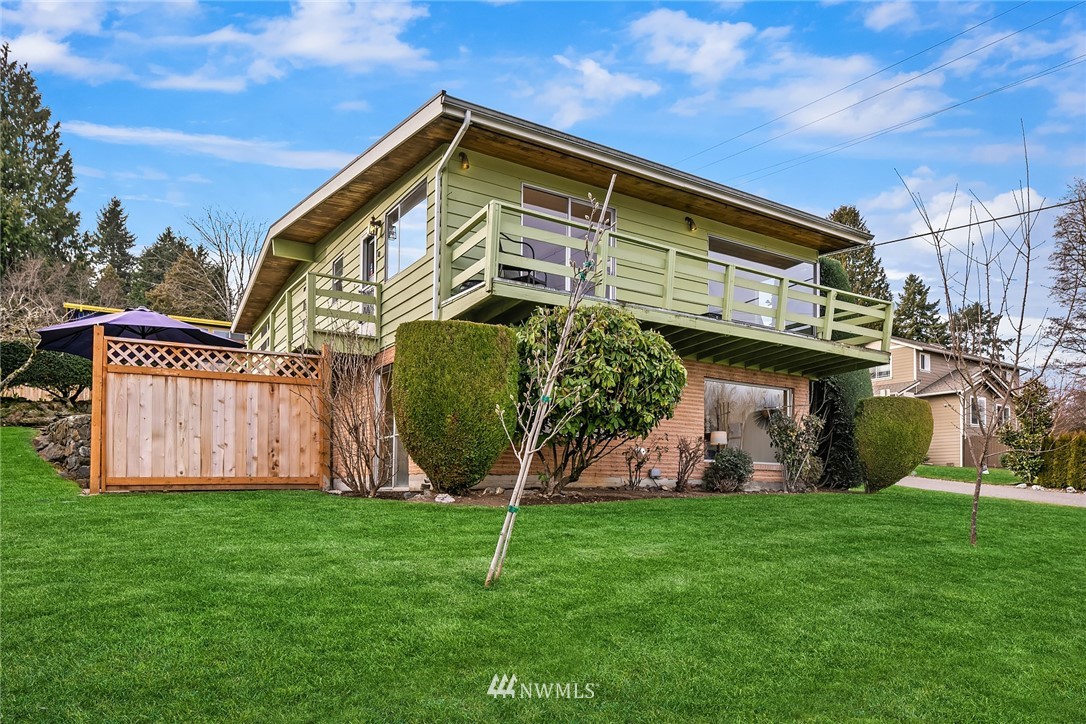203 Northwest 4th Street Renton, WA 98057 - Photo 3 of 27 a front view of a house with garden