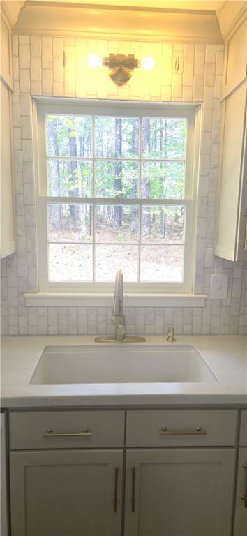 11013 Clearwater Drive Hampton, GA 30228 - Photo 12 of 23 a sink sitting next to a window