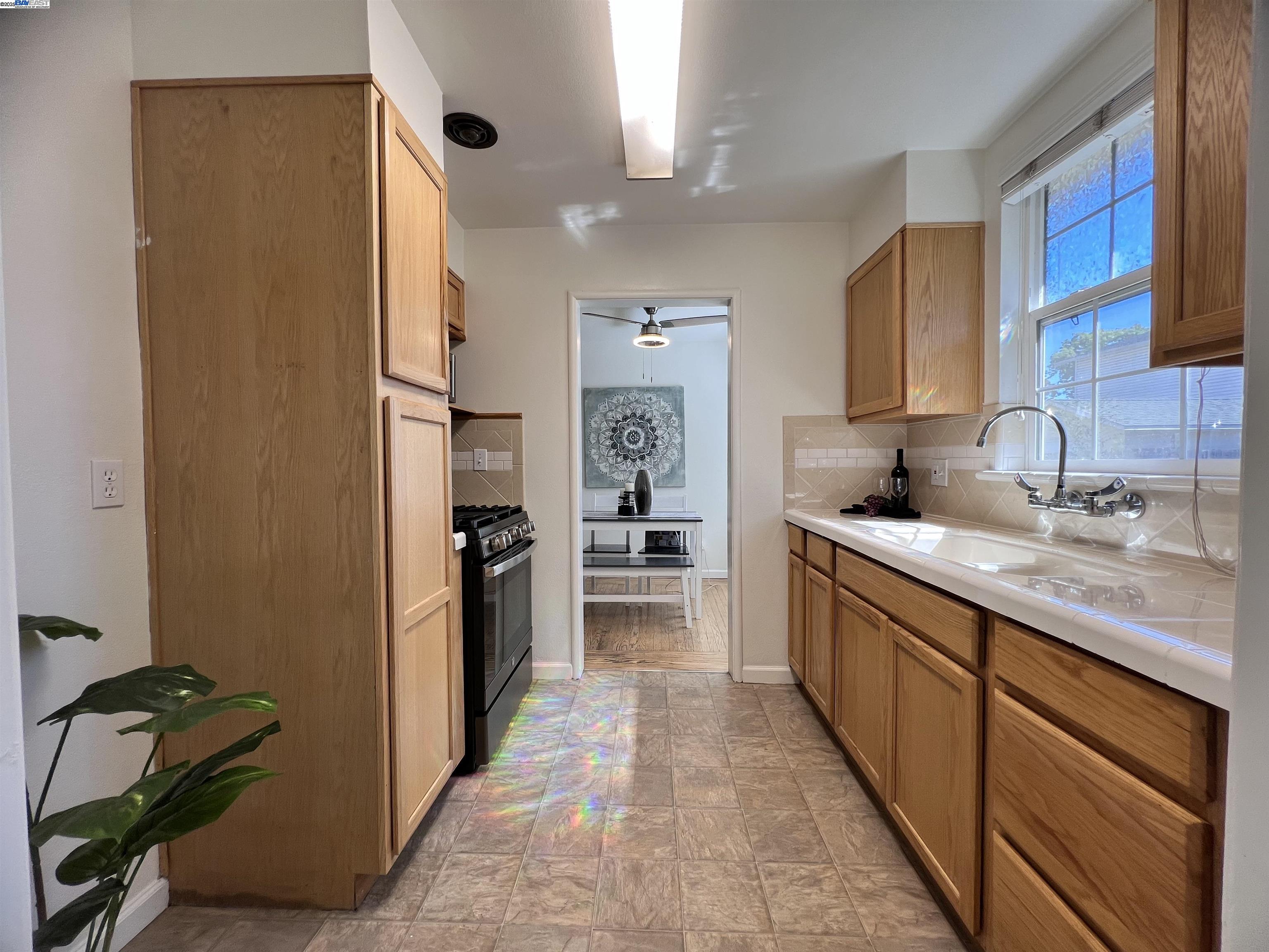 1727 Second Street Livermore, CA 94550 - Photo 13 of 24 a open kitchen with stainless steel appliances granite countertop a refrigerator and a sink