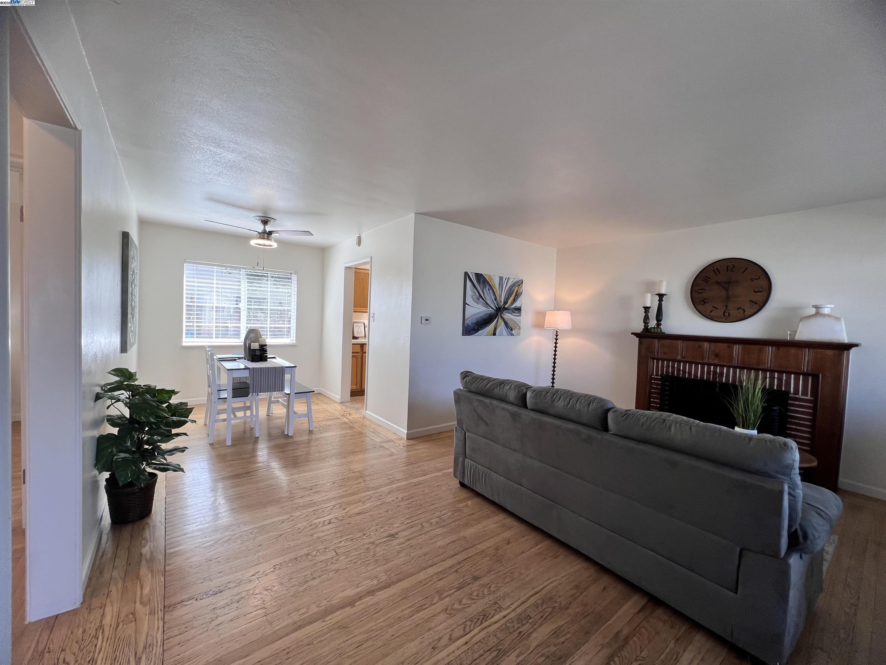 1727 Second Street Livermore, CA 94550 - Photo 4 of 24 a living room with furniture and a fireplace