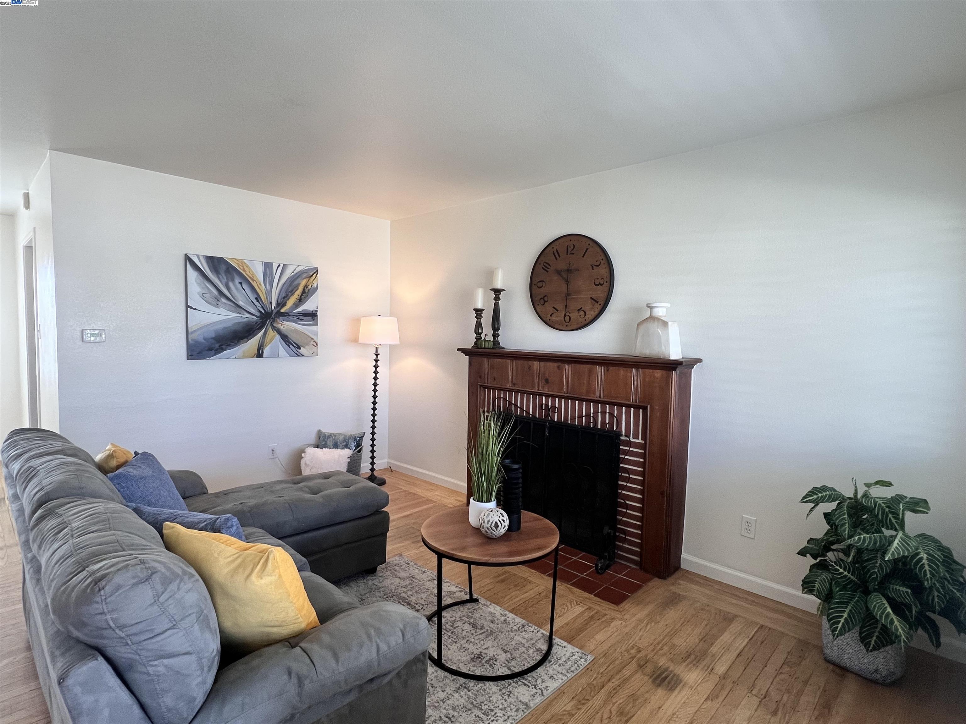 1727 Second Street Livermore, CA 94550 - Photo 5 of 24 a living room with furniture and a fireplace