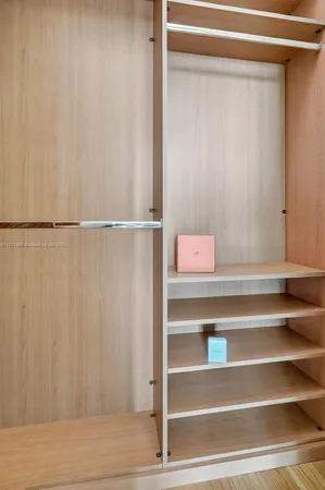 a view of balcony with floor to ceiling windows