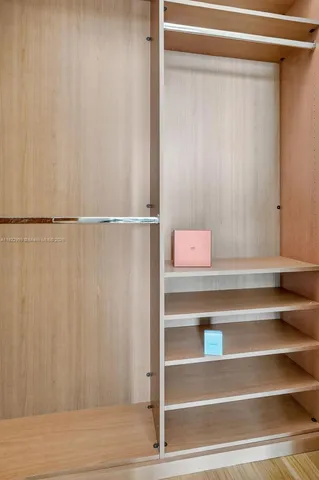 a view of balcony with floor to ceiling windows