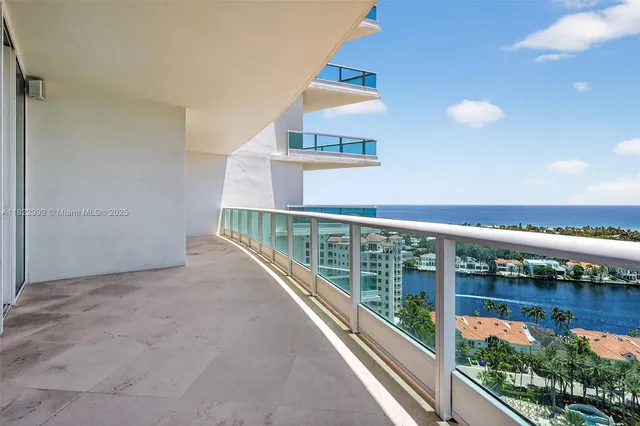 a living room with furniture and white walls