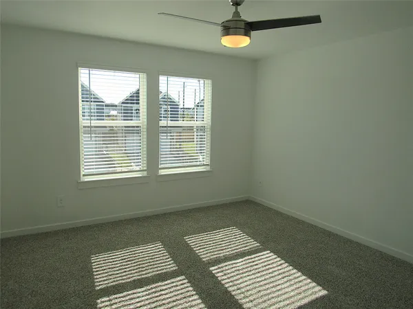 an empty room with a bench
