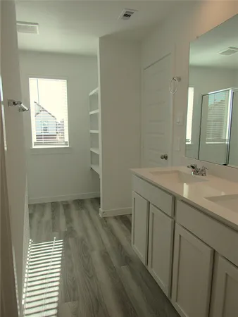 a view of small space with racks on the wall