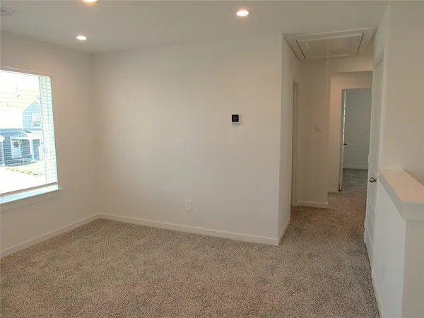 a bathroom with a toilet a sink and bathtub