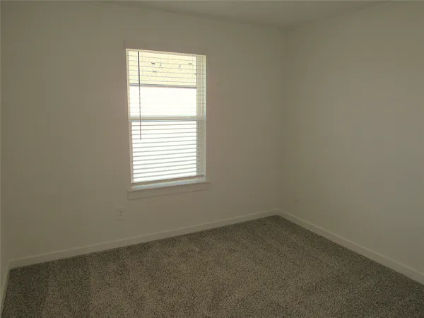 an empty room with closet