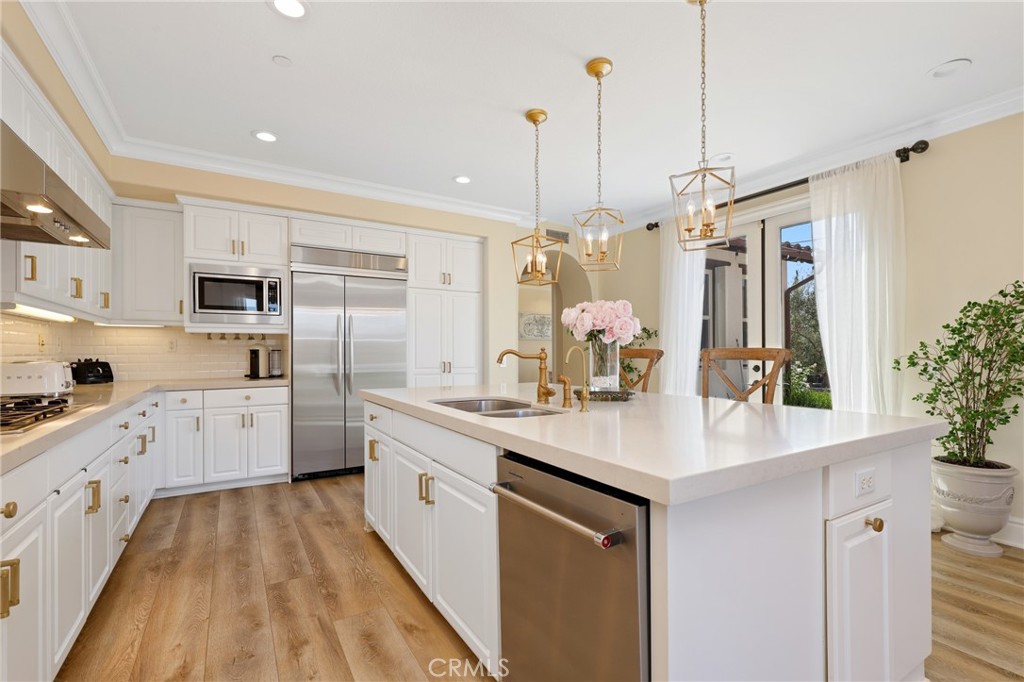 1 David Street Ladera Ranch, CA 92694 - Photo 11 of 66 a kitchen with kitchen island granite countertop lots of counter top space and sink