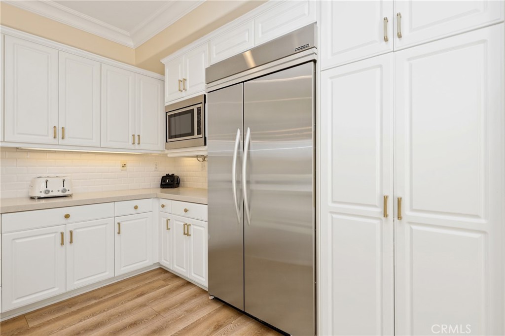 1 David Street Ladera Ranch, CA 92694 - Photo 14 of 66 a kitchen with cabinets and stainless steel appliances