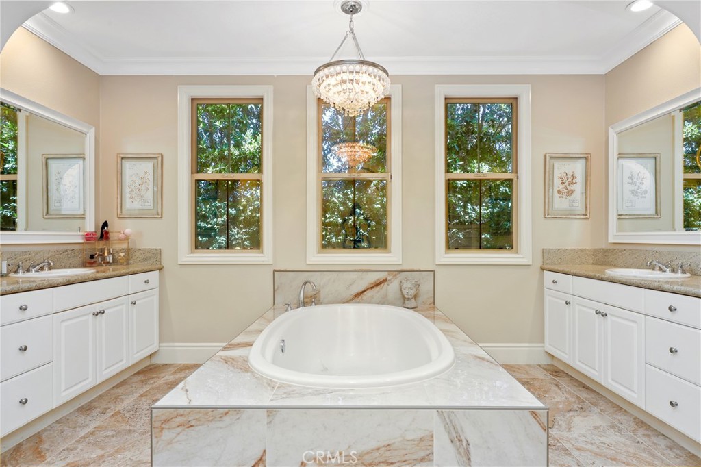 1 David Street Ladera Ranch, CA 92694 - Photo 20 of 66 a white bath tub sitting in a bathroom next to a window