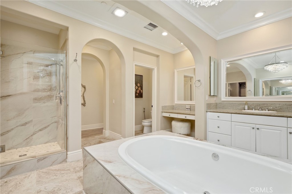 1 David Street Ladera Ranch, CA 92694 - Photo 22 of 66 a spacious bathroom with a tub sink and mirror