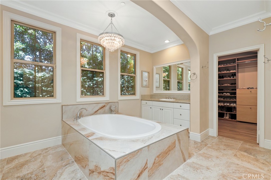 1 David Street Ladera Ranch, CA 92694 - Photo 23 of 66 a spacious bathroom with a tub a sink and a large mirror