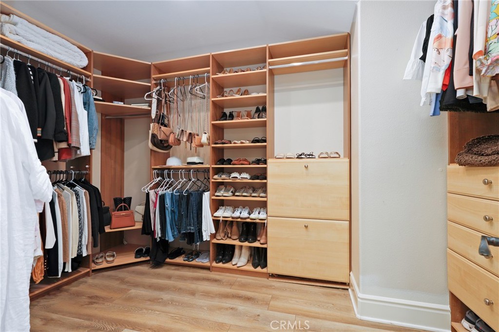 1 David Street Ladera Ranch, CA 92694 - Photo 24 of 66 a view of walk in closet with clothes and shoes