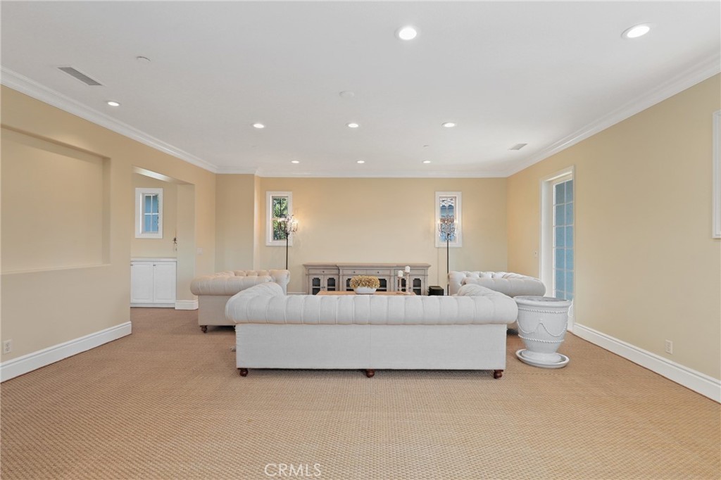 1 David Street Ladera Ranch, CA 92694 - Photo 33 of 66 a spacious bedroom with a bed and a couch