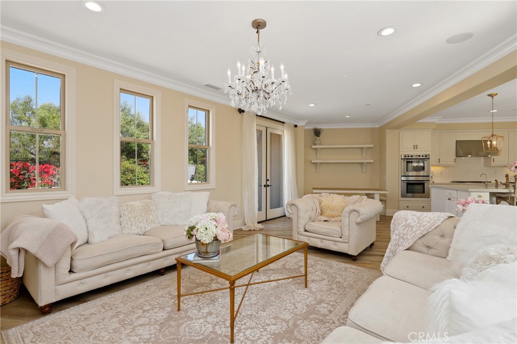 1 David Street Ladera Ranch, CA 92694 - Photo 4 of 66 a living room with furniture and a chandelier