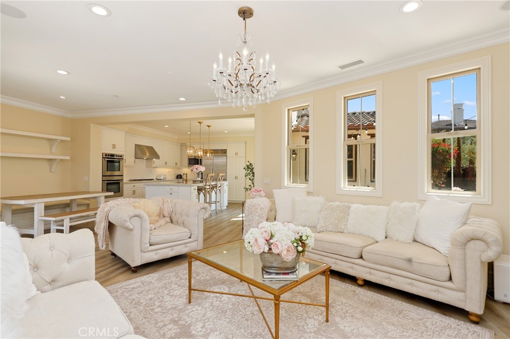 1 David Street Ladera Ranch, CA 92694 - Photo 5 of 66 a living room with furniture and a chandelier