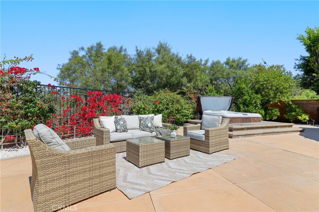 1 David Street Ladera Ranch, CA 92694 - Photo 55 of 66 a view of backyard with seating space and trees in the background