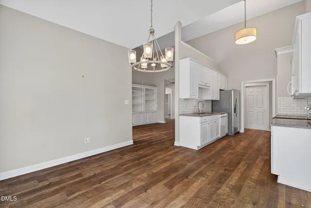 a view of storage and utility room with empty racks