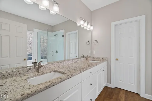 a bathroom with a tub and a sink