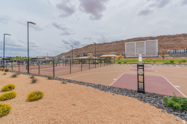 1693 Devils Gdn Lane Washington, UT 84780 - Photo 43 of 64 Outdoor sports courts featuring a basketball court and multiple tennis courts