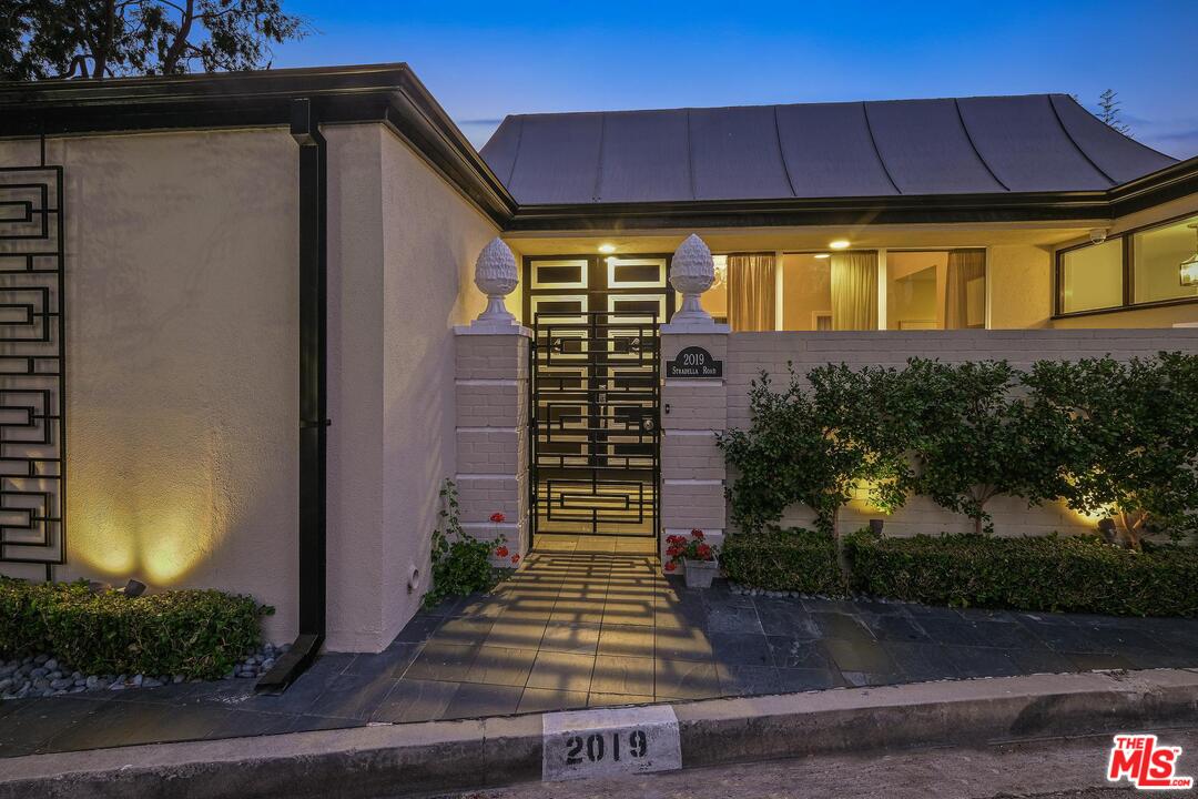 2019 Stradella Road Los Angeles, CA 90077 - Photo 2 of 45 a front view of a house