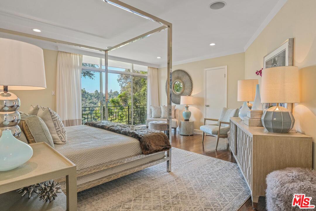 2019 Stradella Road Los Angeles, CA 90077 - Photo 16 of 45 a bed room with a bed and a couch