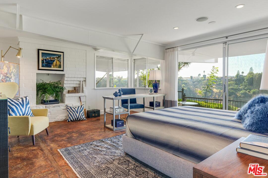2019 Stradella Road Los Angeles, CA 90077 - Photo 26 of 45 a living room with furniture and a large window