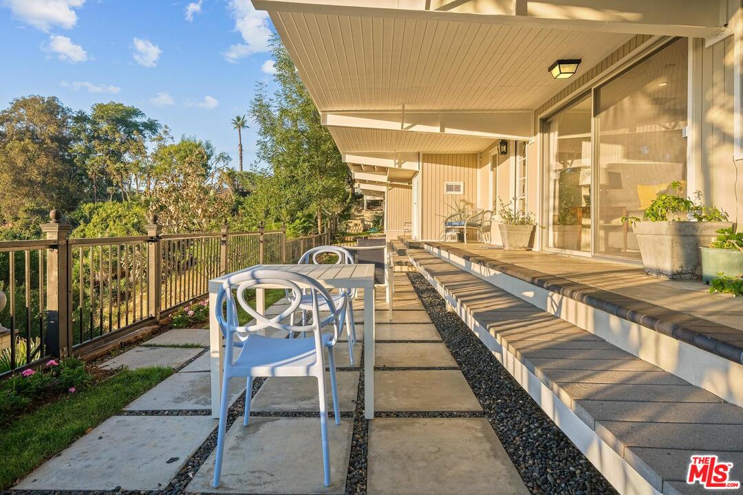 2019 Stradella Road Los Angeles, CA 90077 - Photo 29 of 45 a view of a balcony with chairs
