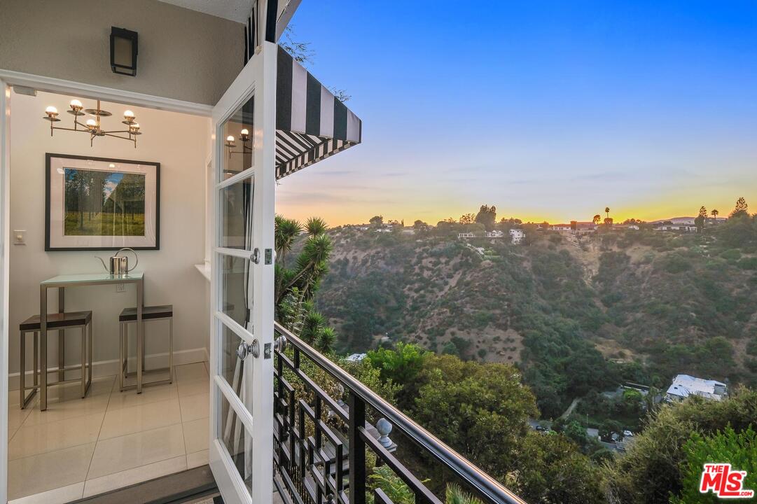 2019 Stradella Road Los Angeles, CA 90077 - Photo 33 of 45 a view of a balcony with an outdoor space