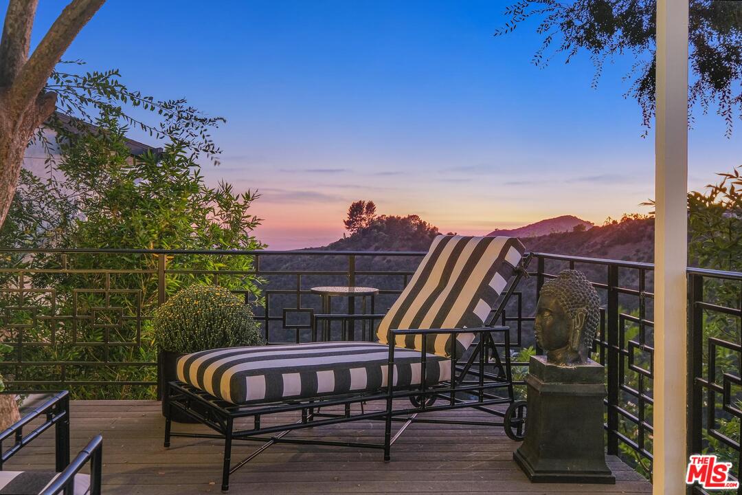 2019 Stradella Road Los Angeles, CA 90077 - Photo 40 of 45 a view of a chairs and table in the patio
