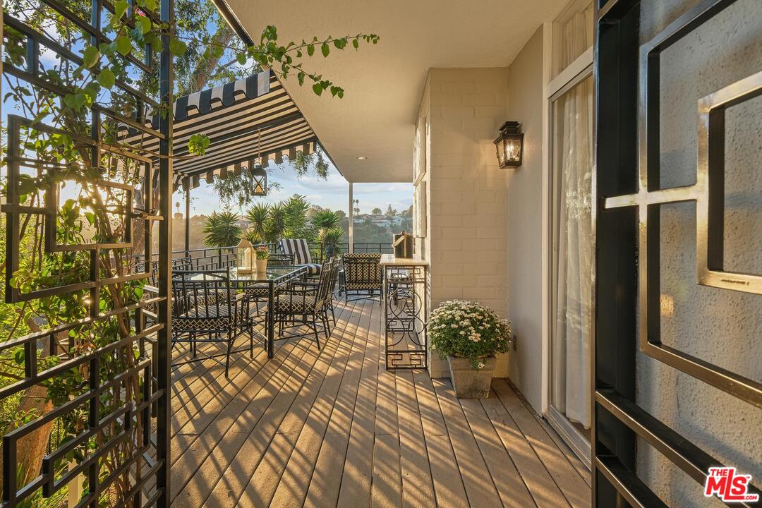2019 Stradella Road Los Angeles, CA 90077 - Photo 8 of 45 a view of a balcony with a potted plant
