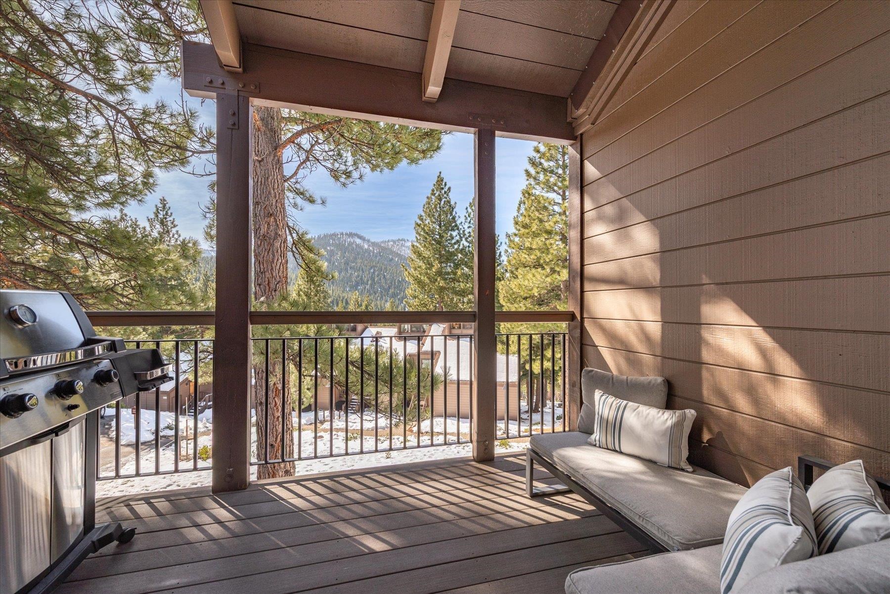6090 Rocky Point Truckee, CA 96161 - Photo 13 of 28 a living room with furniture and a floor to ceiling window