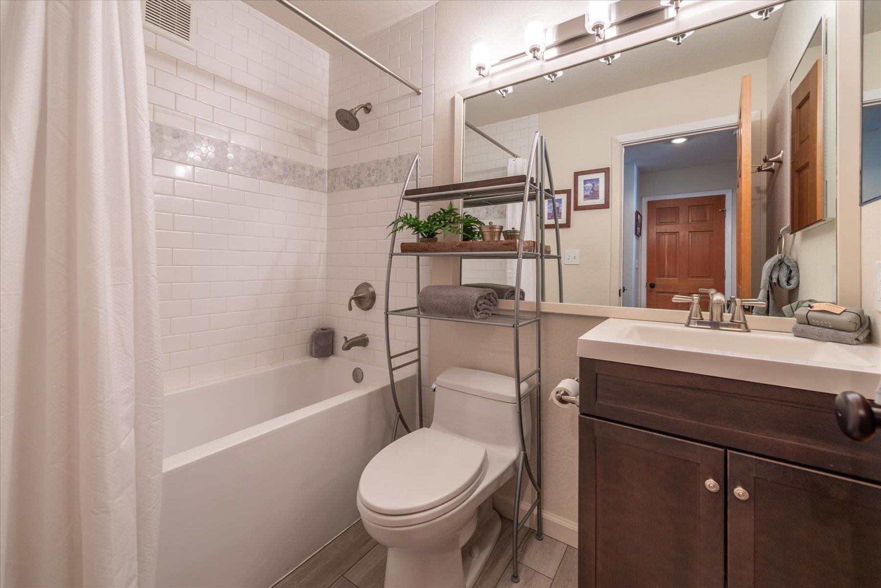 6090 Rocky Point Truckee, CA 96161 - Photo 18 of 28 a bathroom with a sink toilet and shower