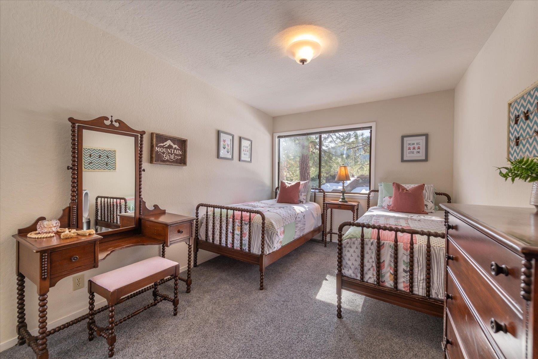 6090 Rocky Point Truckee, CA 96161 - Photo 19 of 28 a bedroom with furniture and a window