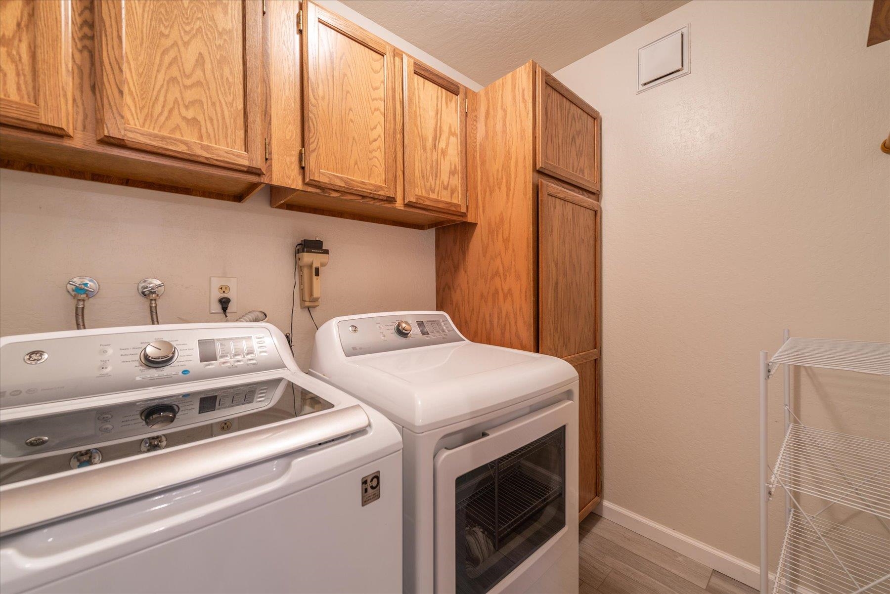 6090 Rocky Point Truckee, CA 96161 - Photo 24 of 28 a utility room with dryer and washer