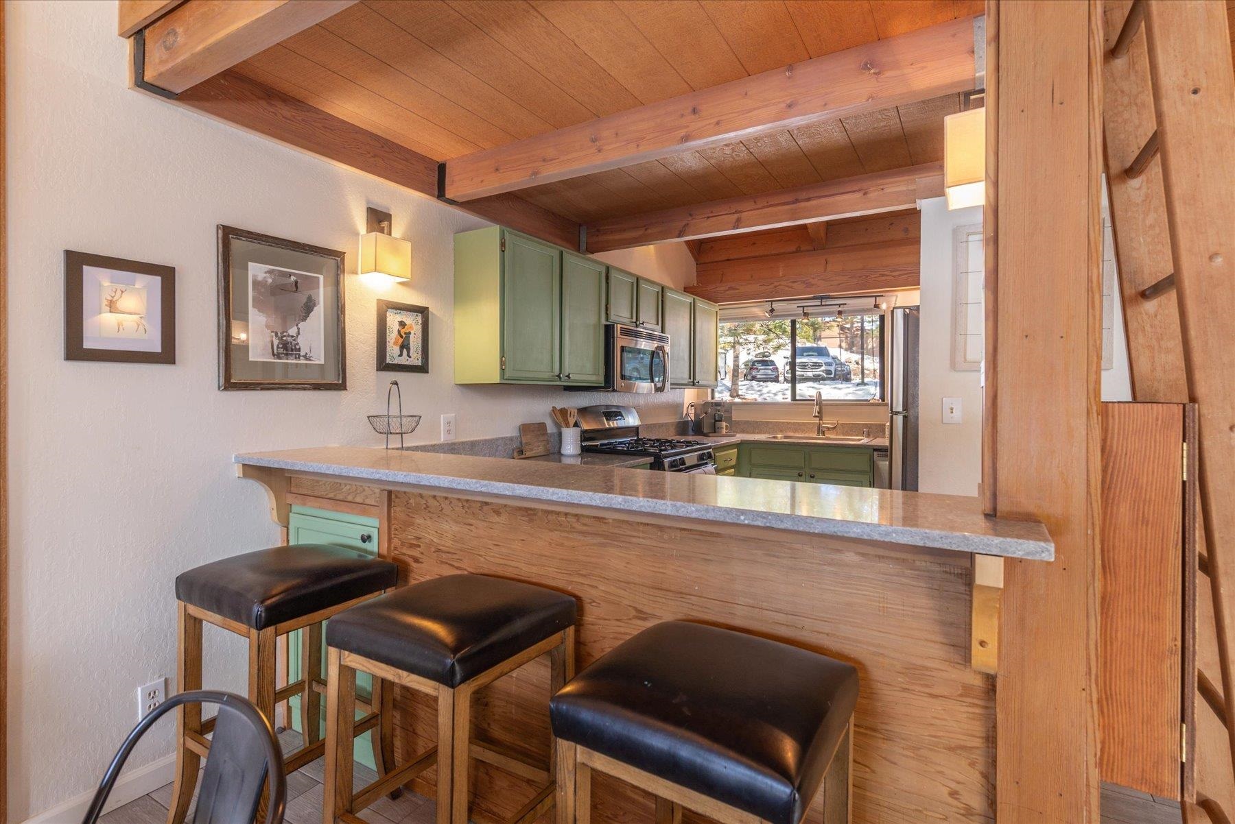 6090 Rocky Point Truckee, CA 96161 - Photo 8 of 28 a kitchen with a sink cabinets and window