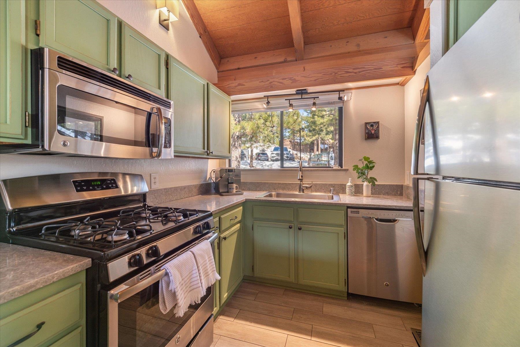 6090 Rocky Point Truckee, CA 96161 - Photo 10 of 28 a kitchen with a stove and a sink