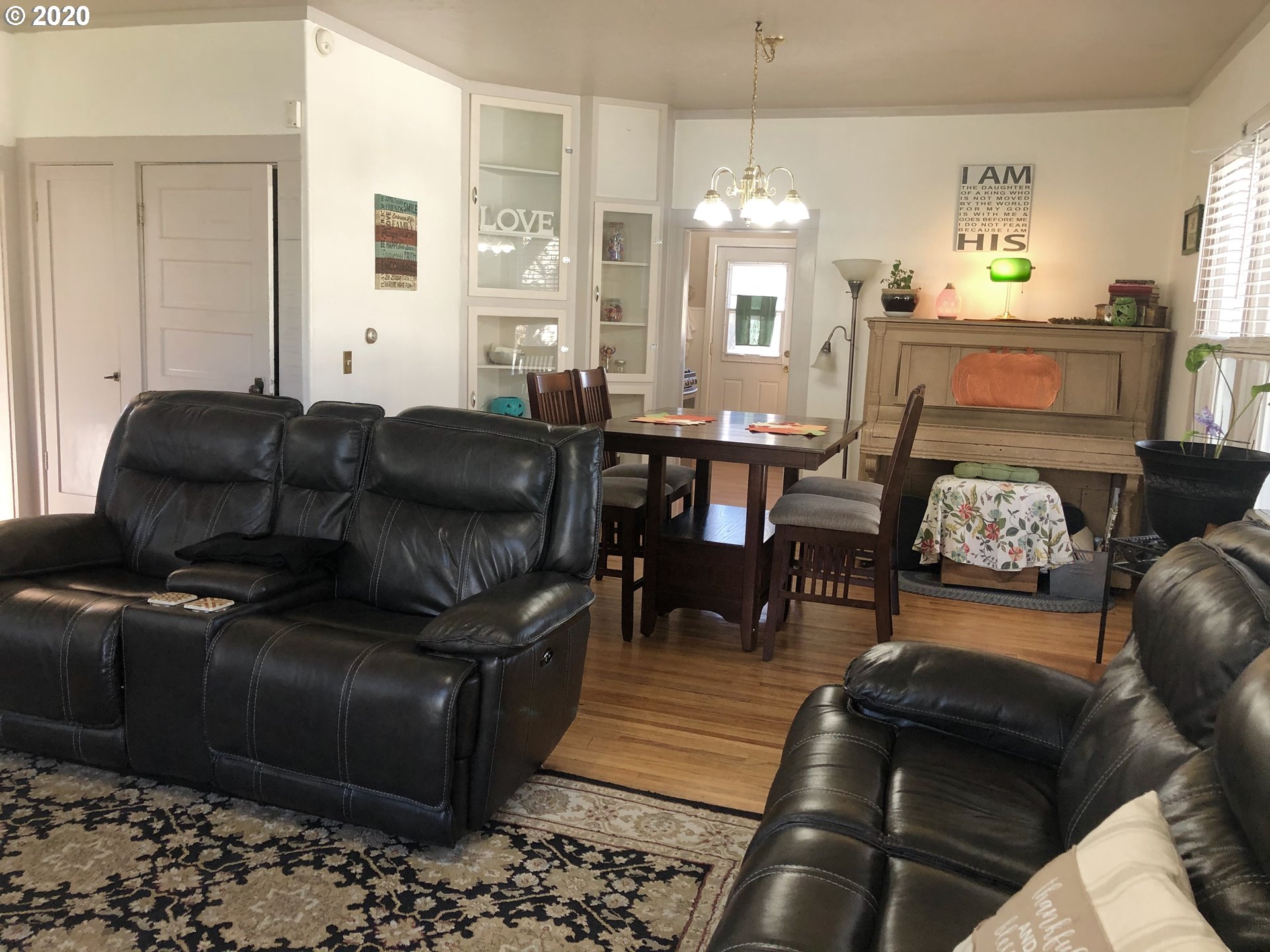 719 Southwest 1st Street Pendleton, OR 97801 - Photo 3 of 17 a living room with furniture and a chandelier