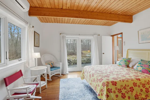 a bed room with a bed and a couch