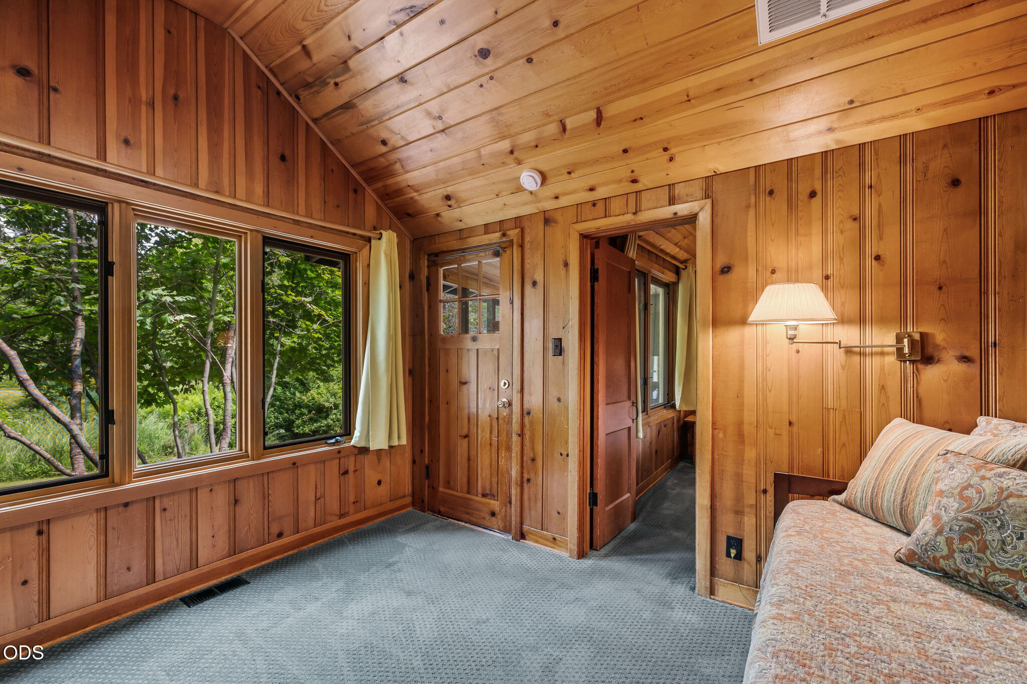 13375 Southwest Forest Service Road, Unit 3 U1 Camp Sherman, OR 97730 - Photo 28 of 29 a view of hallway with furniture and a window