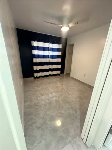 a view of room with a staircase