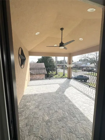 a view of a indoor swimming pool and a chair