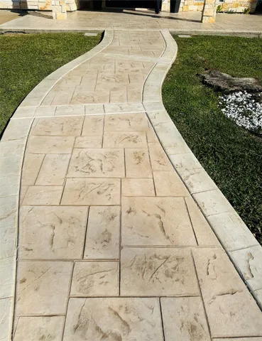 a view of a porch with furniture and a yard