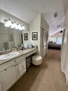 6170 Vía Tierra Boca Raton, FL 33433 - Photo 10 of 13 a en suite bathroom with a double vanity sink and a mirror