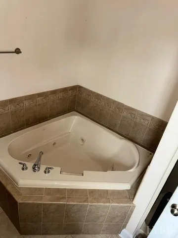 a bathroom with a bathtub