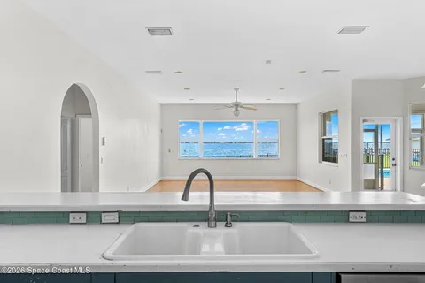 a bathroom with a double vanity sink toilet and shower