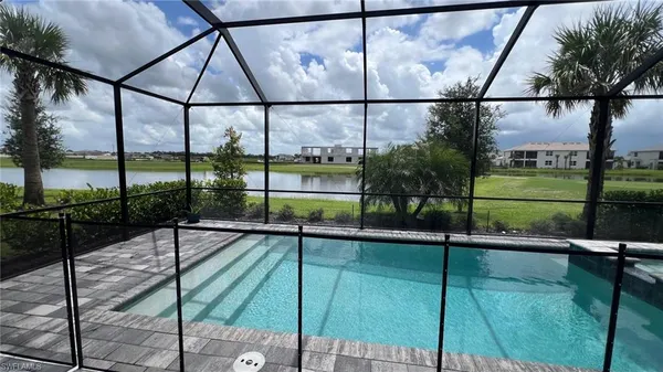 a view of outdoor space with swimming pool