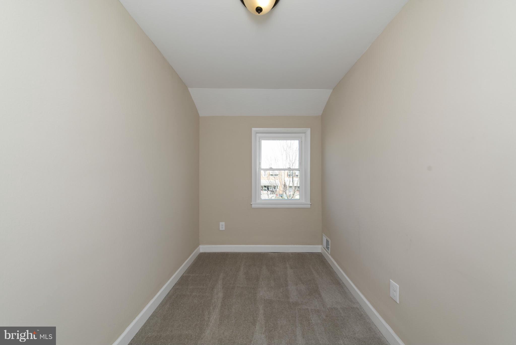 1939 Frames Road Baltimore, MD 21222 - Photo 22 of 30 a view of an empty room with a window